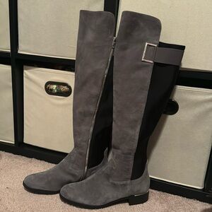 Gray and black knee boots